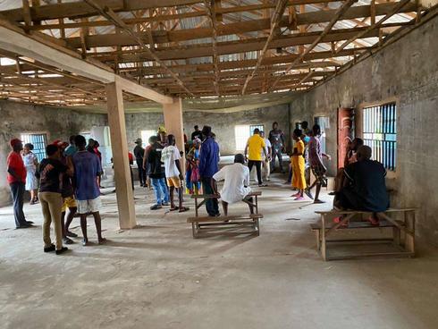 Voters at PU 002 Eke Amiri, Eziama Ikeduru, waiting to cast their votes.