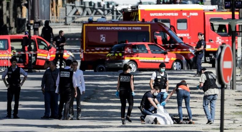 A radical Islamist rammed his car into a police van on Paris's famous Champs-Elysees Avenue on Monday