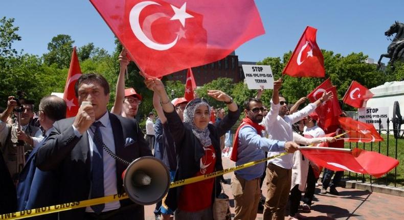 Two people were arrested and nine were injured after clashes between pro- and anti-Erdogan demonstrators in Washington on Tuesday