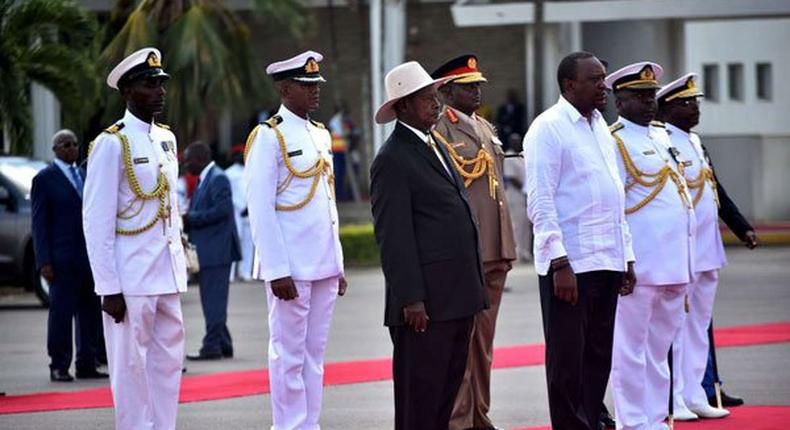President Uhuru Kenyatta and Yoweri Museveni in Mombasa after inspecting a guard of honor