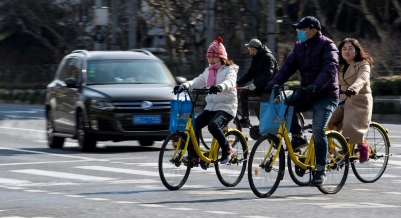 People ride Ofo-bicycles in Shanghai