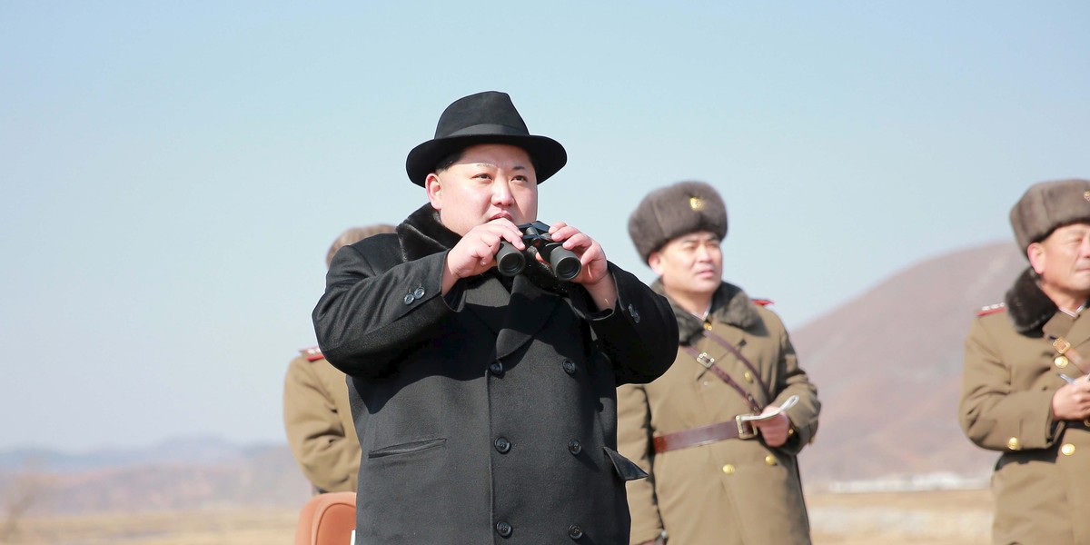 North Korean leader Kim Jong Un inspects a flight drill of fighter pilots from the Korean People's Army's (KPA) Air and Anti-Air Force, in this undated photo released by North Korea's Korean Central News Agency (KCNA) in Pyongyang on February 21, 2016.