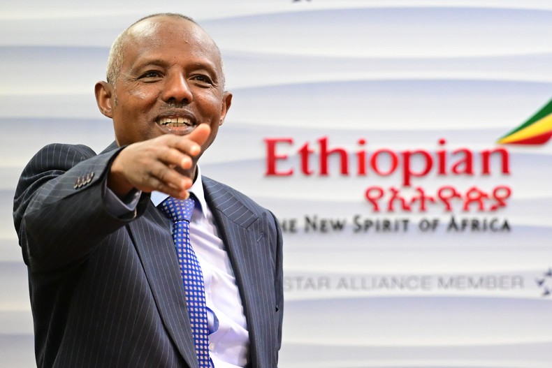 Mesfin Tasew Bekele, CEO of Ethiopian Airlines, stands in a conference room. [Photo by Sebastian Gollnow/picture alliance via Getty Images]