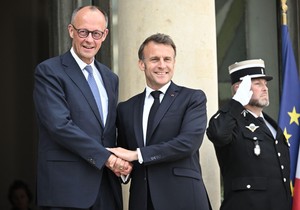 Fridrih Merc i Emanuel Makron