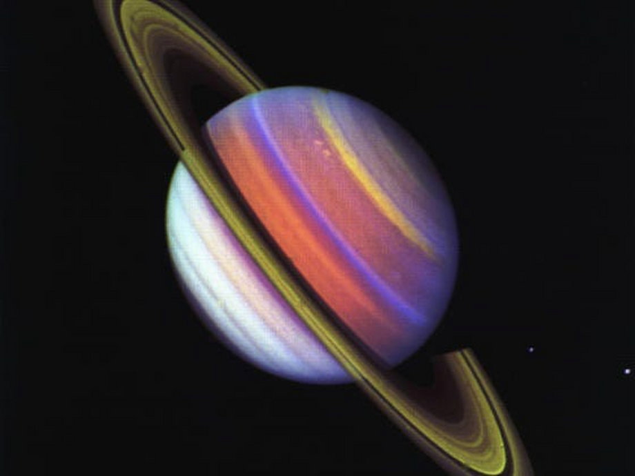 To capture this image, NASA used three images from the Voyager 2 probe - taken with ultraviolet, purple, and green filters.