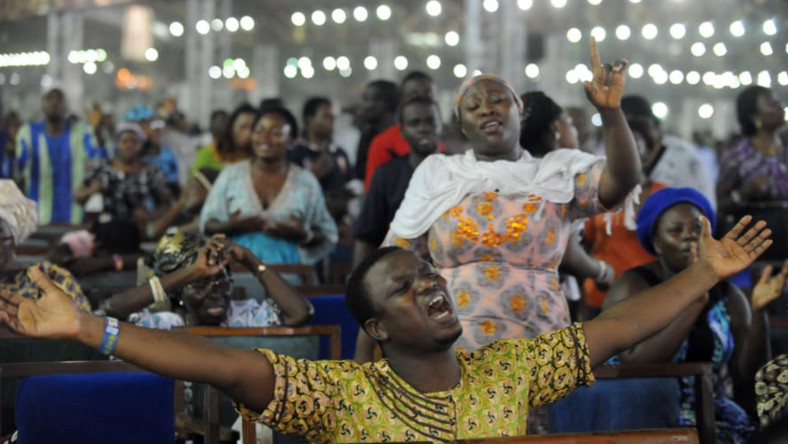 A service at a Pentecostal church on New Year's Day in Lagos, Nigeria, in 2014 [PIUS UTOMI EKPEI/AFP/Getty Images]