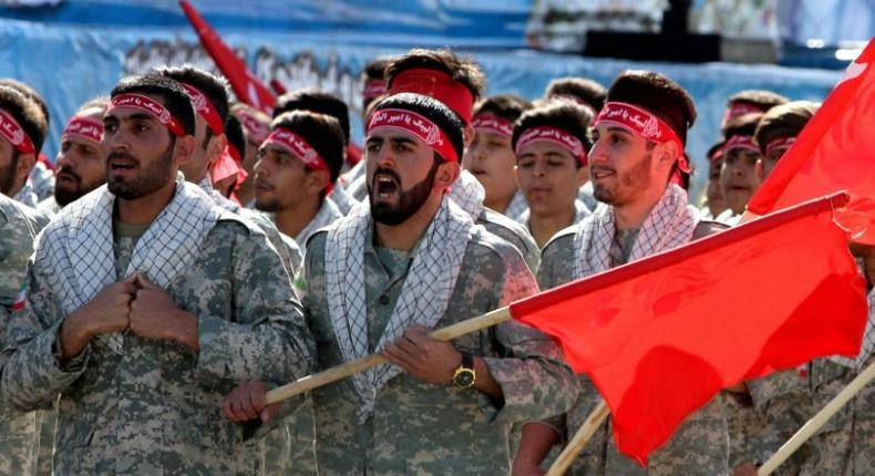 Iranian members of the Basij militia march during a parade marking the country's Army Day