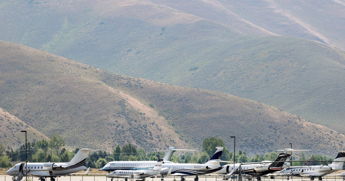 Private jets are descending on a smalltown airport as the 'summer camp