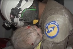 Rescue volunteer bursts into tears after rescuing a baby girl caught in Assad bombings