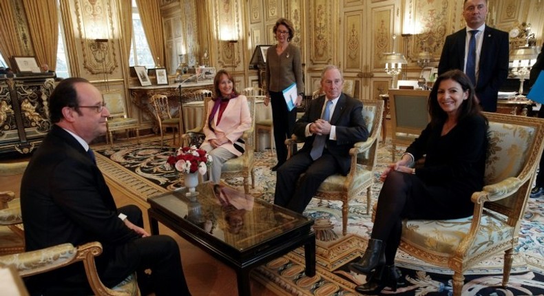 French president Francois Hollande, French Minister for Ecology, Sustainable Development and Energy Segolene Royal, former New York City Mayor Michael Bloomberg and Paris mayor Anne Hidalgo during a meeting in Paris, on March 9, 2017