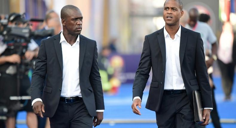Clarence Seedorf and his assistant Patrick Kluivert arrive for the match against Nigeria in Africa Cup of Nations round of 16, their last in charge of Cameroon