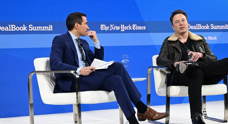 Left to right: Andrew Ross Sorkin and Elon Musk speak onstage during The New York Times DealBook Summit 2023.Slaven Vlasic/Getty Images for The New York Times
