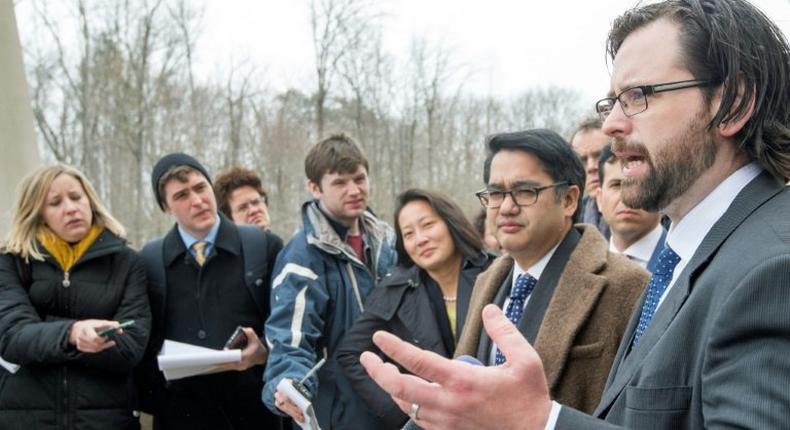 Attorneys for the ACLU, Omar Jadwat (L) and Justin Cox (R) deliver remarks to the media outside US District Court, Southern District of Maryland, March 15, 2017, in Greenbelt, Maryland