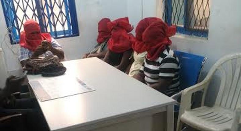 During the identification process the faces of the female teachers were covered with red cloth, to protect them from future attacks.