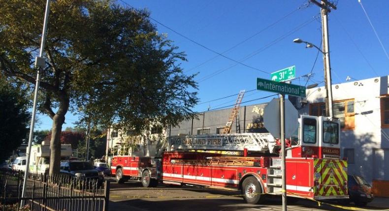 Firefighters said the two-storey warehouse in Oakland seemed to have no sprinklers or smoke detectors