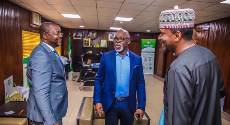 Amaju Pinnick (C) with Nigeria's Minister for Youth and Sports, Sunday Dare (L), and Chairman of Nigeria's League Management Company, Shehu Dikko (R) (Twitter/@thenff via Ope Adelani)