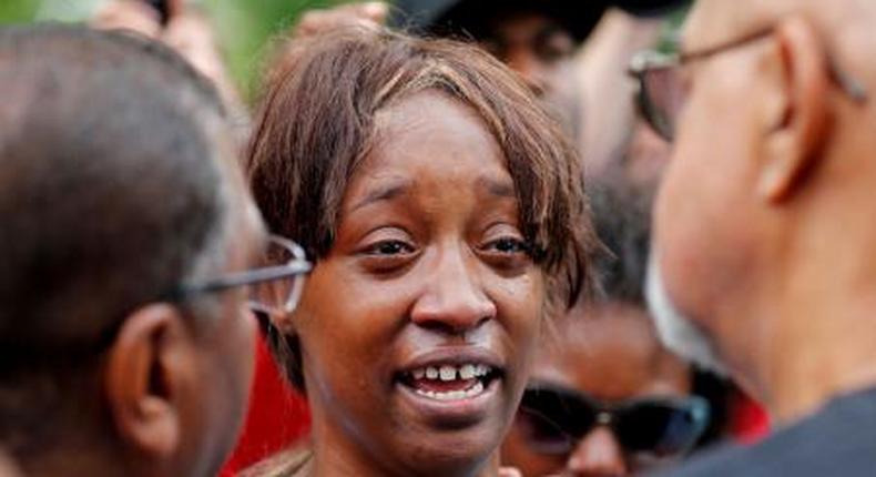 Diamond Reynolds weeps after she recounts the incidents that led to the fatal shooting of her boyfriend Philando Castile by Minneapolis area police during a traffic stop on Wednesday, at a Black Lives Matter demonstration in front of the Governors Mansion in St. Paul, Minnesota, U.S., July 7, 2016.