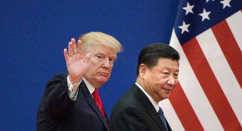 US President Donald Trump (L) and China's President Xi Jinping are facing a trade war that has weighed heavily on the outlook for the Asian giant, the world's second-largest economy