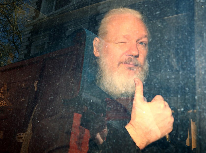 WikiLeaks founder Julian Assange arrives at the Westminster Magistrates Court, after he was arrested