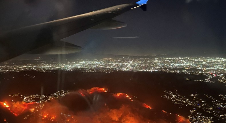 The view from a flight passing over the Palisades fire on Tuesday.Mark Viniello/Mark Viniello via REUTERS