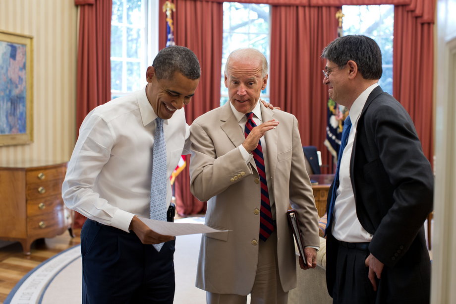 Obama talks with Biden and Chief of Staff Jack Lew in the Oval Office on July 26, 2012.