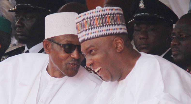 President Muhammadu Buhari shares a laugh with Senate President, Bukola Saraki on October 1, 2015 in Abuja