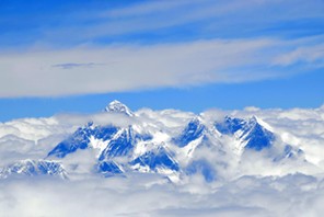 View from above on Mt. Everest surrounded by clouds Tibet China