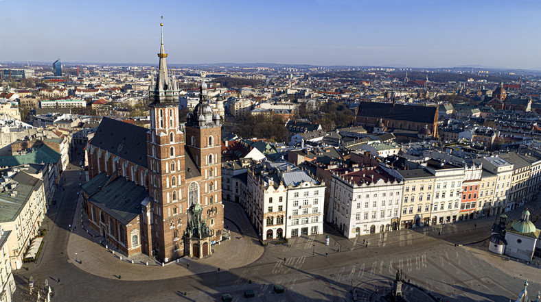 Zdjęcia z albumu Andrzeja Nowakowskiego "Czas. Rynek Główny w Krakowie"