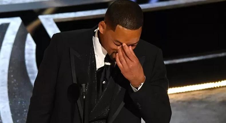 Will Smith en pleurs après avoir reçu l'Oscar du meilleur acteur Il a été récompensé quelques minutes à peine après avoir frappé Chris Rock - AFP