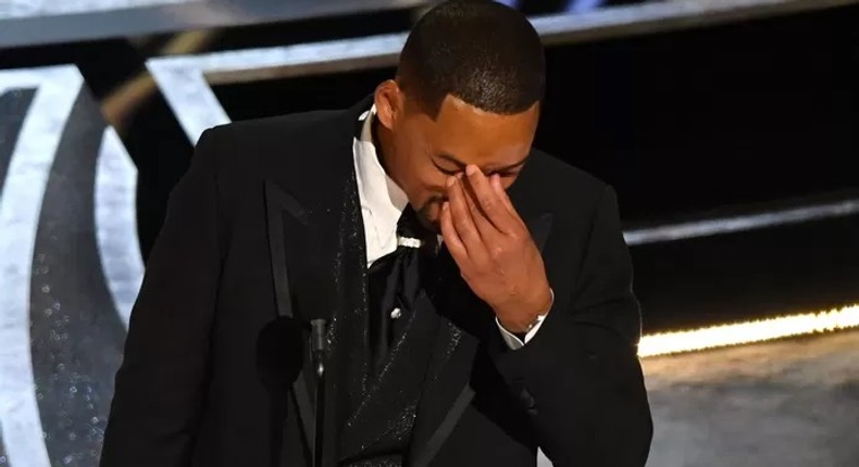 Will Smith en pleurs après avoir reçu l'Oscar du meilleur acteur Il a été récompensé quelques minutes à peine après avoir frappé Chris Rock - AFP