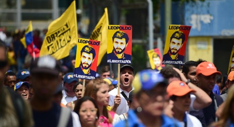 Protesters rally in April outside the entrance to the Ramo Verde penitentiary in Los Teques, near Caracas, where Venezuelan opposition leader Leopoldo Lopez is imprisoned