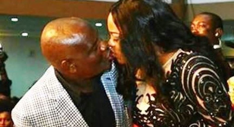 Rivers State Governor, Nyesom Wike and wife, Eberechi kissing at AMAA 2016