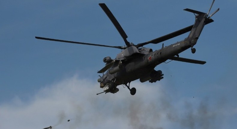 A Russian military helicopter takes part in an exercise on the Black Sea coast in Crimea