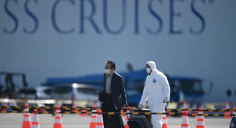 There are worries over allowing former Diamond Princess passengers to roam freely around Japan's notoriously crowded cities, even if they have tested negative for the coronavirus