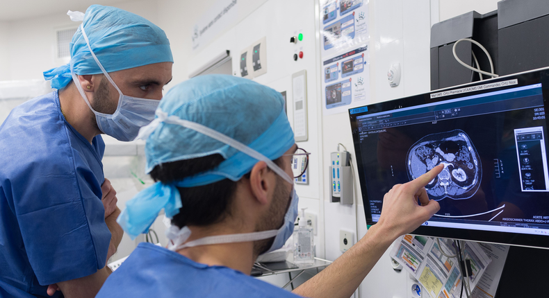 doctors looking at a scan