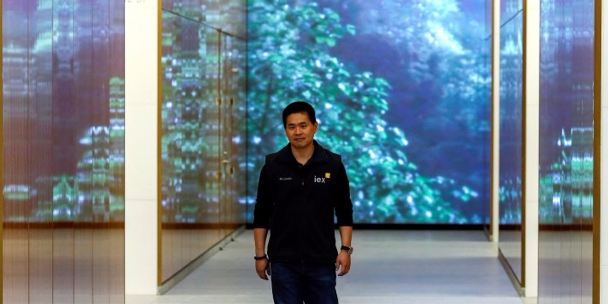 Katsuyama, chief executive of IEX Group, walks in the lobby of 4 World Trade Center in New York