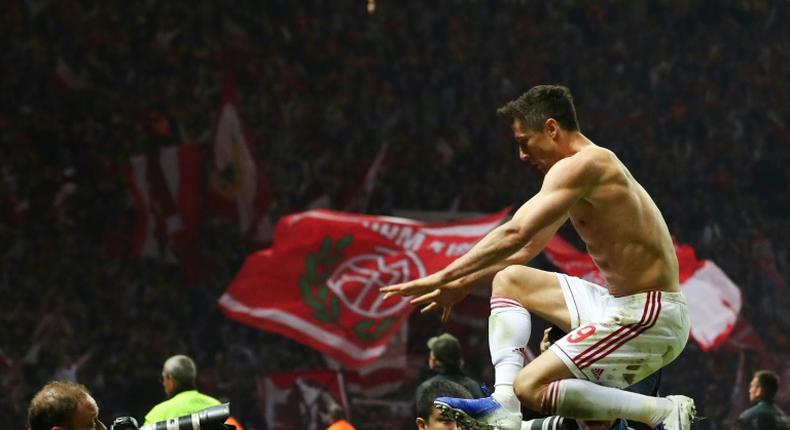 Robert Lewandowski helped Bayern Munich to a 3-0 win over RB Leipzig in the German Cup final on Saturday