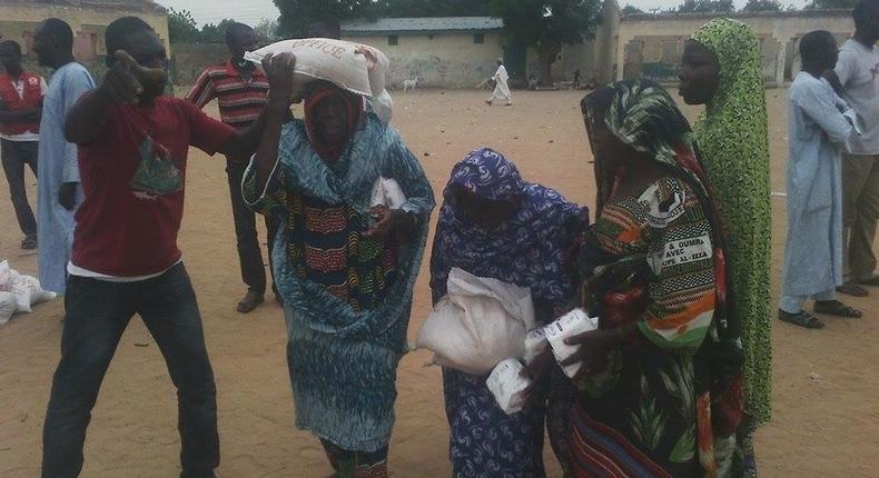 Elderly women reviewing relief materials in Internally displaced persons (IDPs) camps in Magumeri Borno State. Photos: Ibrahim Yerwabe