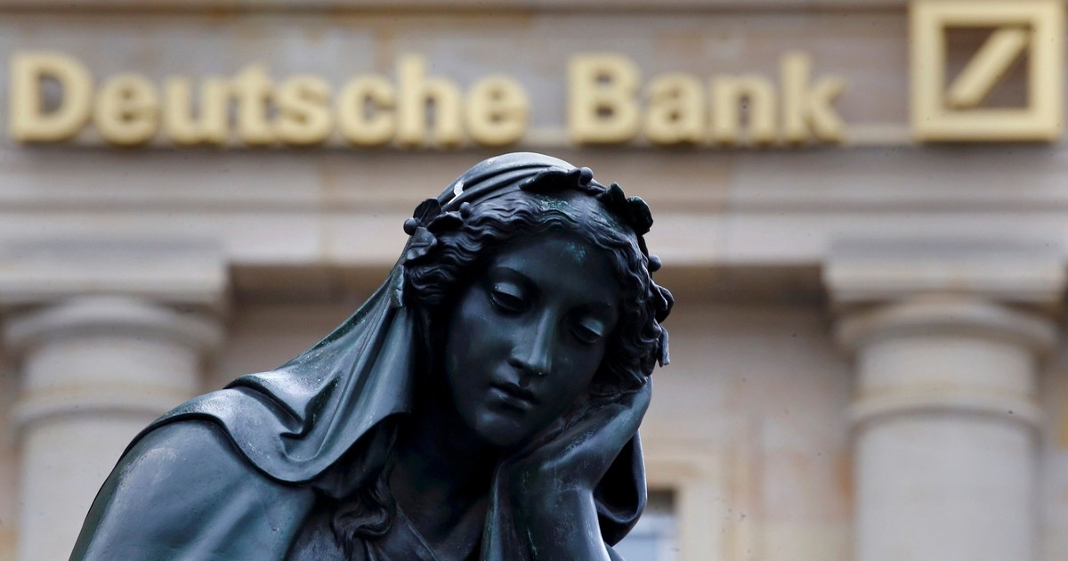 Deutsche Bank slides after layoffs begin as part of its 8.3 billion