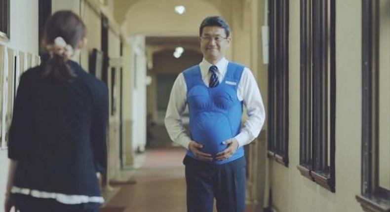 Japanese politicians wear pregnancy vests to urge men to help at home