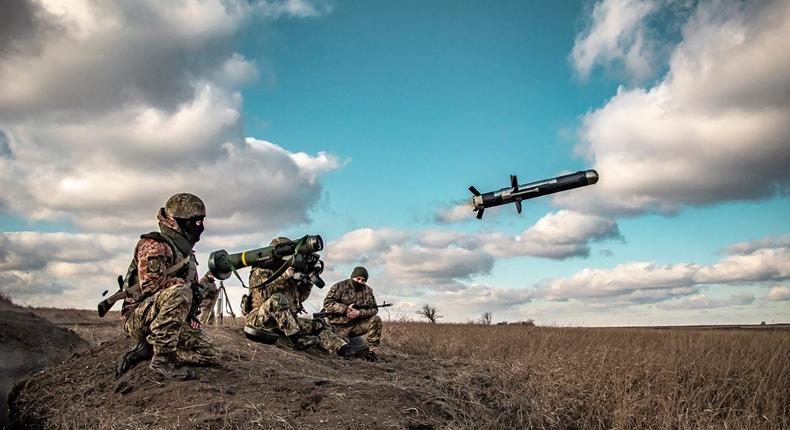 In this image released by Ukrainian Defense Ministry Press Service, Ukrainian soldiers use a launcher with US Javelin missiles.Ukrainian Defense Ministry Press Service via AP