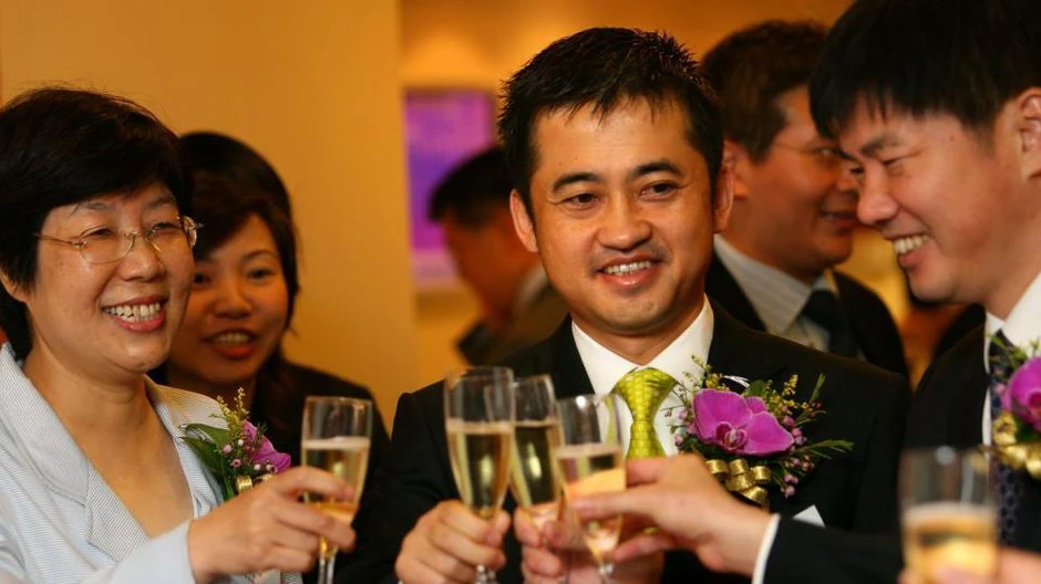 Predsednik kompanije Ante Ding Šidžung (u sredini), 2007. godine | Foto: Getty Images