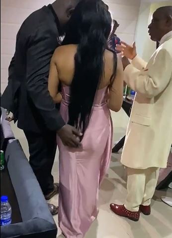 Groom captured in a video grabbing and playing with bride’s ass while pastor prays for them