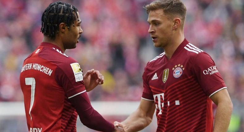 Bayern Munich midfielder Joshua Kimmich (R) and goal-scorer Serge Gnabry (L) during Saturday's league win Creator: Christof STACHE