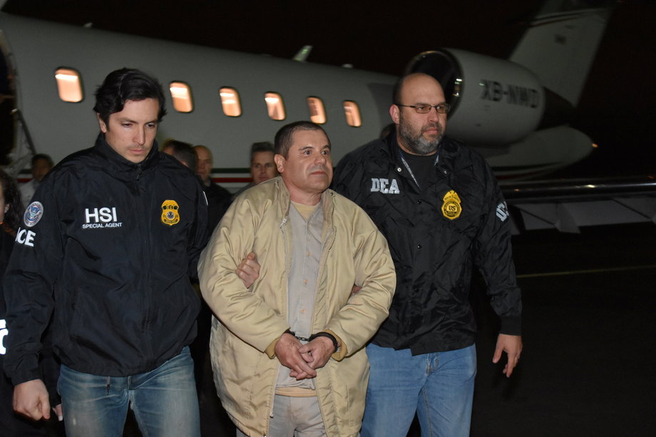 Mexican drug lord Joaquin "El Chapo" Guzman arrives at Long Island MacArthur airport in New York, January 19, 2017, after his extradition from Mexico.