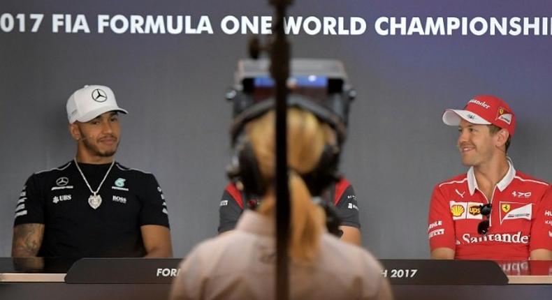 Sebastian Vettel (R) currently has a 20 point lead over Lewis Hamilton, who will be competing in front of a home crowd at the British Grand Prix