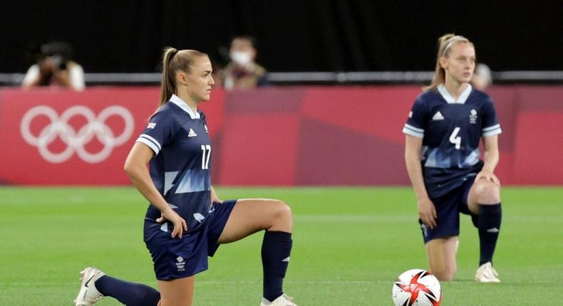 Team GB players took the knee before their win over Chile Creator: ASANO IKKO