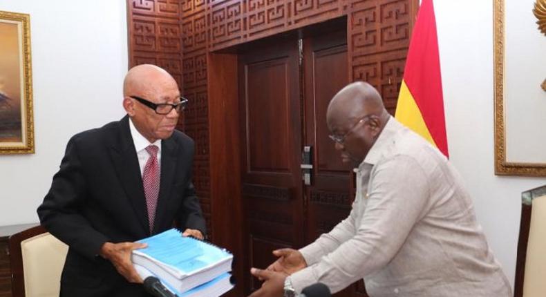 Justice Emile Short presents report to Nana Addo