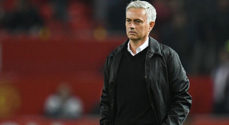 Manchester United's Portuguese manager Jose Mourinho stands on the pitch after the final whistle in the English Premier League football match between Manchester United and Tottenham Hotspur at Old Trafford in Manchester, north west England, on August 27, 2018.