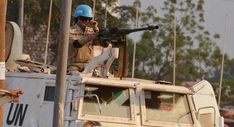 A Moroccan peacekeeper from the United Nations Mission in the Central African Republic (MINUSCA) patrols in Bangui